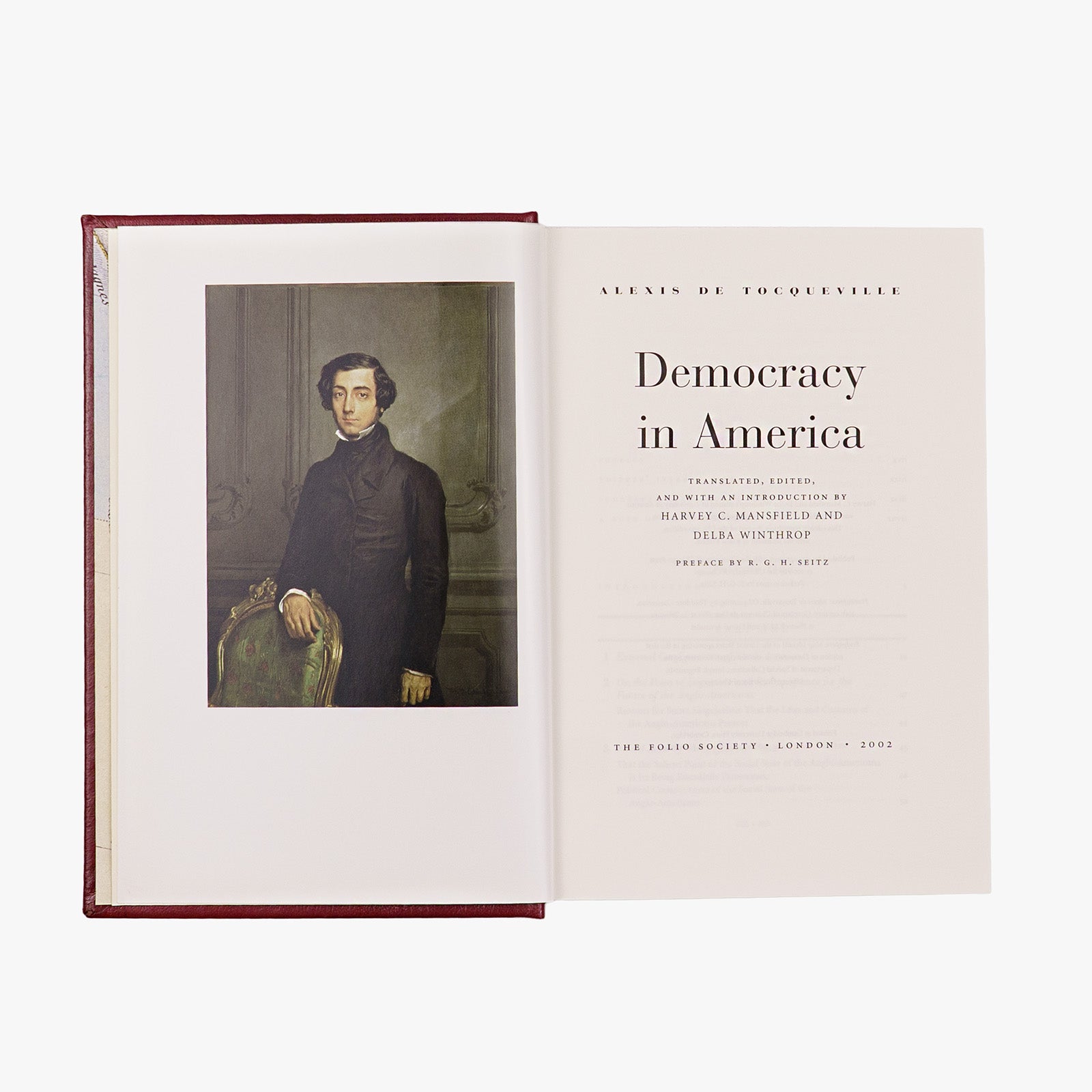 Alexis de Tocqueville — Democracy in America (Folio Society, 2002). Livro físico. Encadernação editorial com douração.