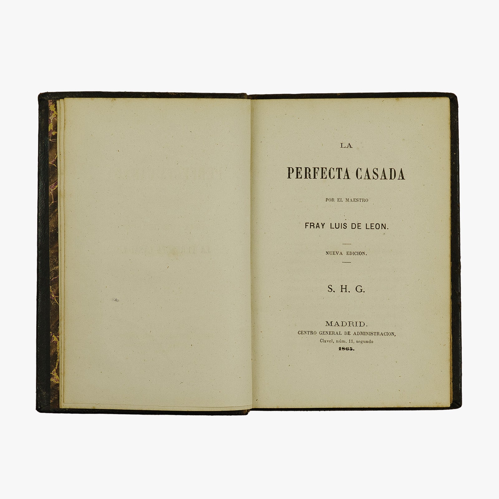 Fray Luis de León — La perfecta casada (Centro General de Administración, 1865). Encadernação em couro com douração. Livro físico.