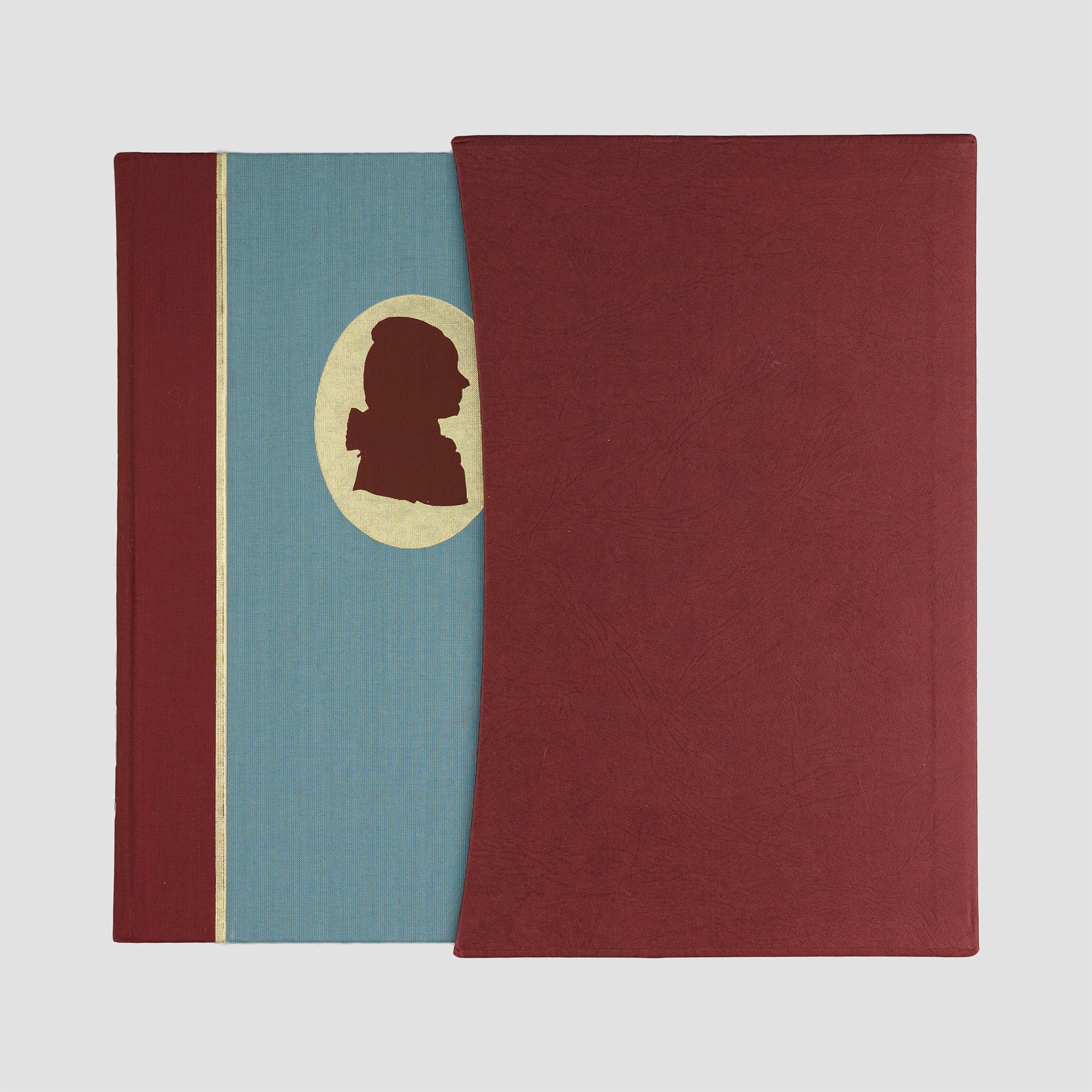 livro The Life of Mozart de Edward Holmes edição Folio Society 1994. Livro saindo do estojo, aparecendo parte da capa. 