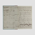livro The Life of Mozart de Edward Holmes edição Folio Society 1994. Folha de guarda com partitura musical. 