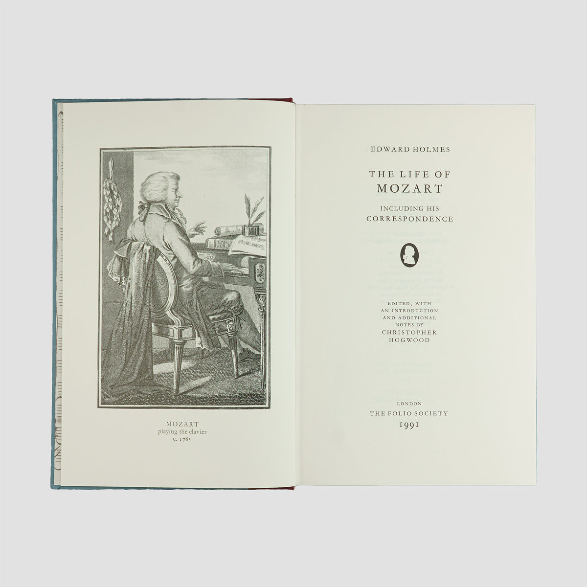 livro The Life of Mozart de Edward Holmes edição Folio Society 1994. Folha de rosto com ilustração do compositor.