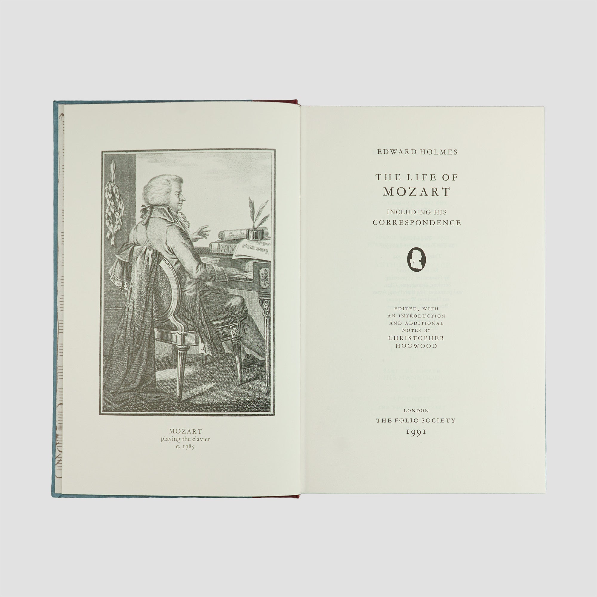 livro The Life of Mozart de Edward Holmes edição Folio Society 1994. Folha de rosto com ilustração do compositor.