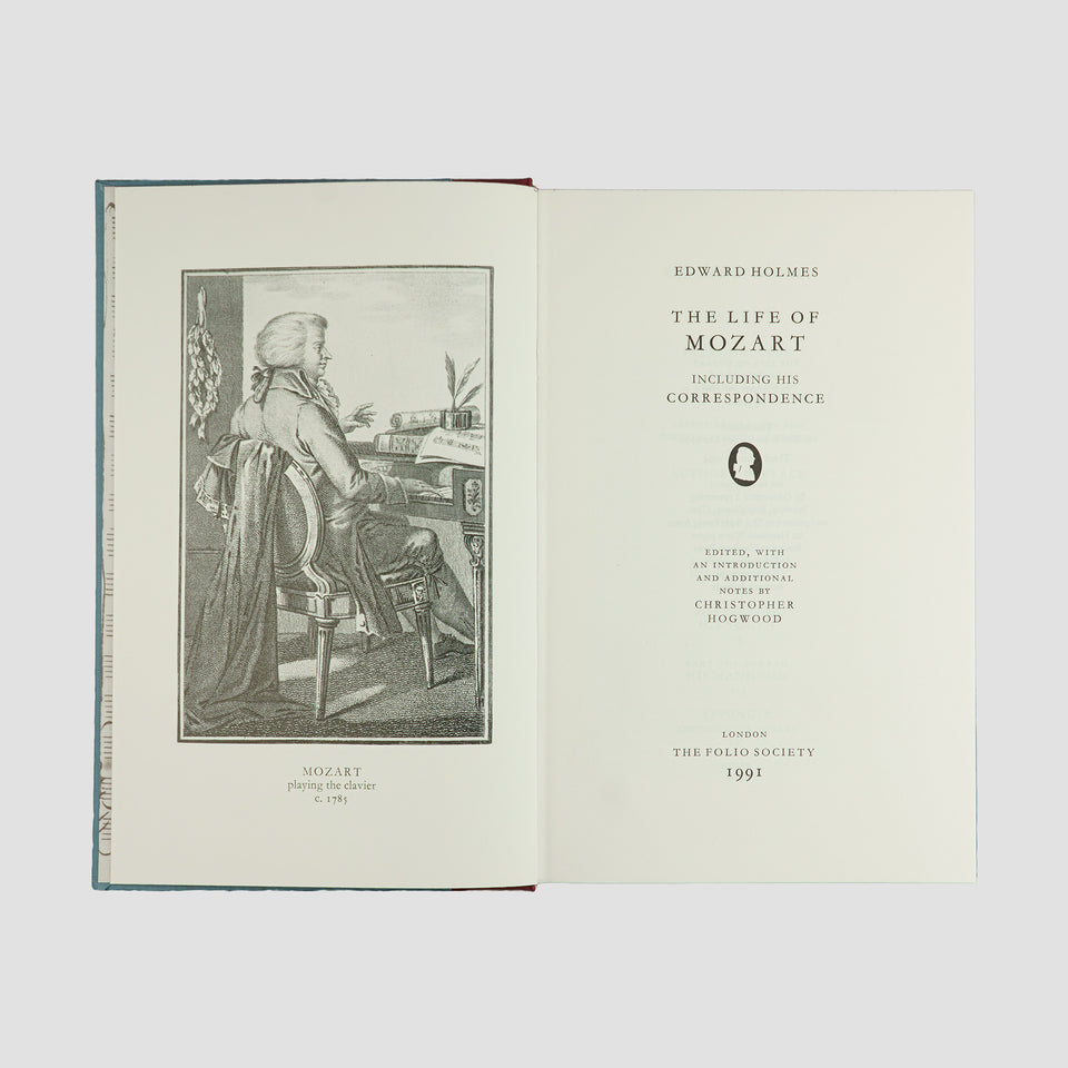 livro The Life of Mozart de Edward Holmes edição Folio Society 1994. Folha de rosto com ilustração do compositor.