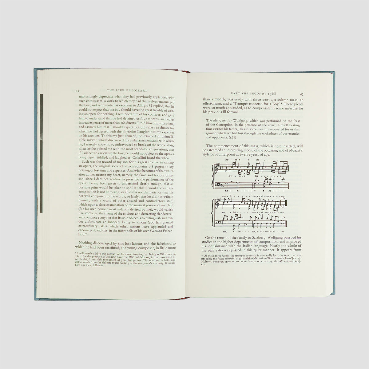 livro The Life of Mozart de Edward Holmes edição Folio Society 1994. Imagens e textos internos, com parte de partitura musical.
