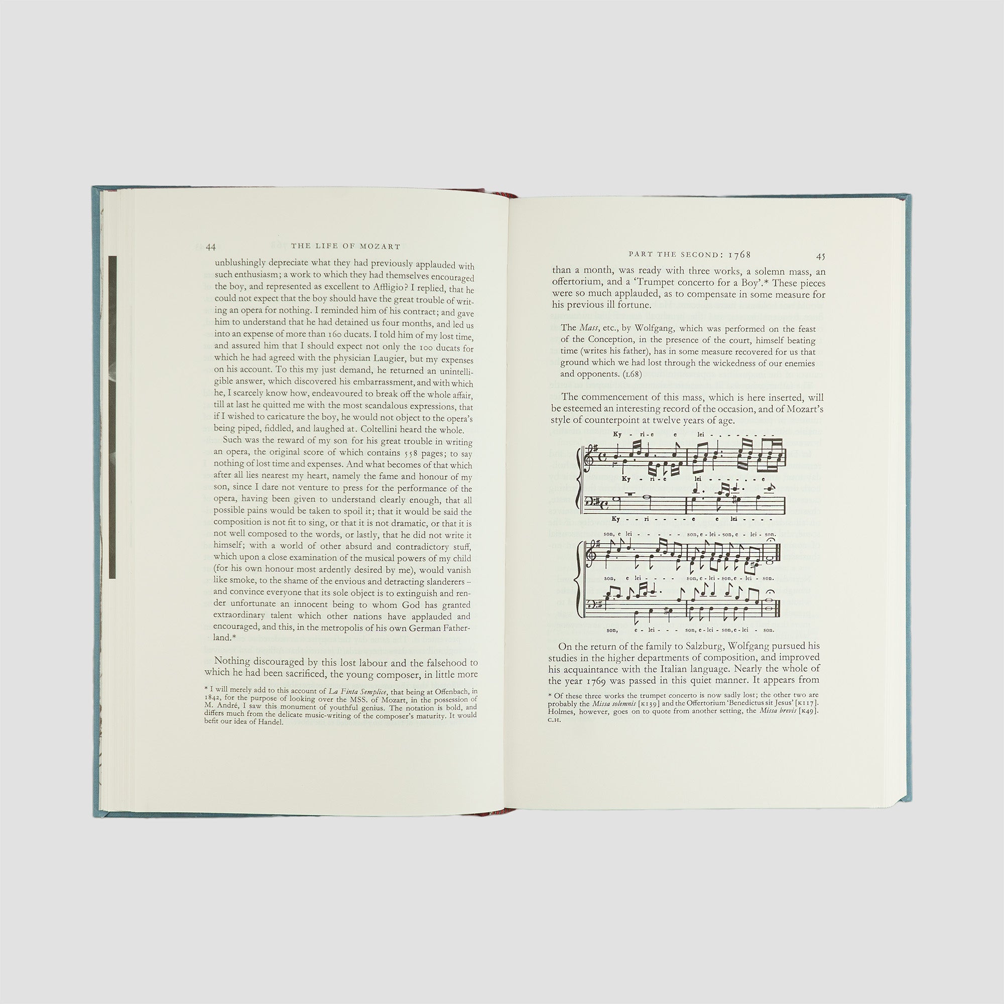 livro The Life of Mozart de Edward Holmes edição Folio Society 1994. Imagens e textos internos, com parte de partitura musical.