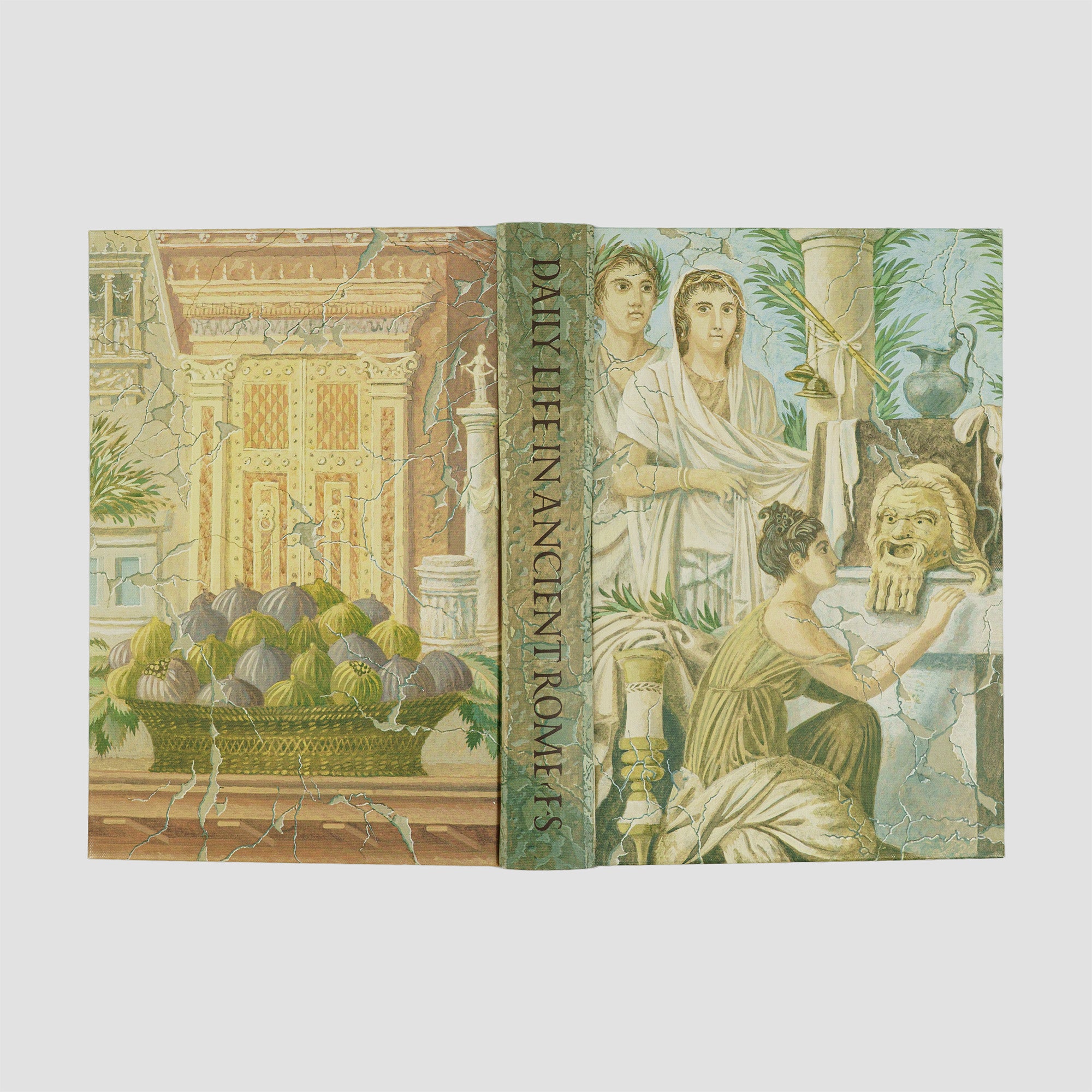 livro Daily Life in Ancient Rome de Jérôme Carcopino edição Folio Society 2004. Livro aberto com ilustrações das capas e lombada.