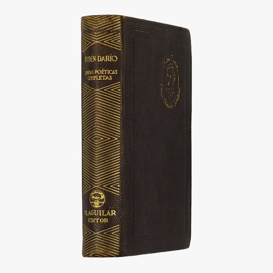 Rubén Darío — Obras poéticas completas (M. Aguilar - Editor, 1945). Encadernação em couro com douração. Cortes tingidos com ornamentos.