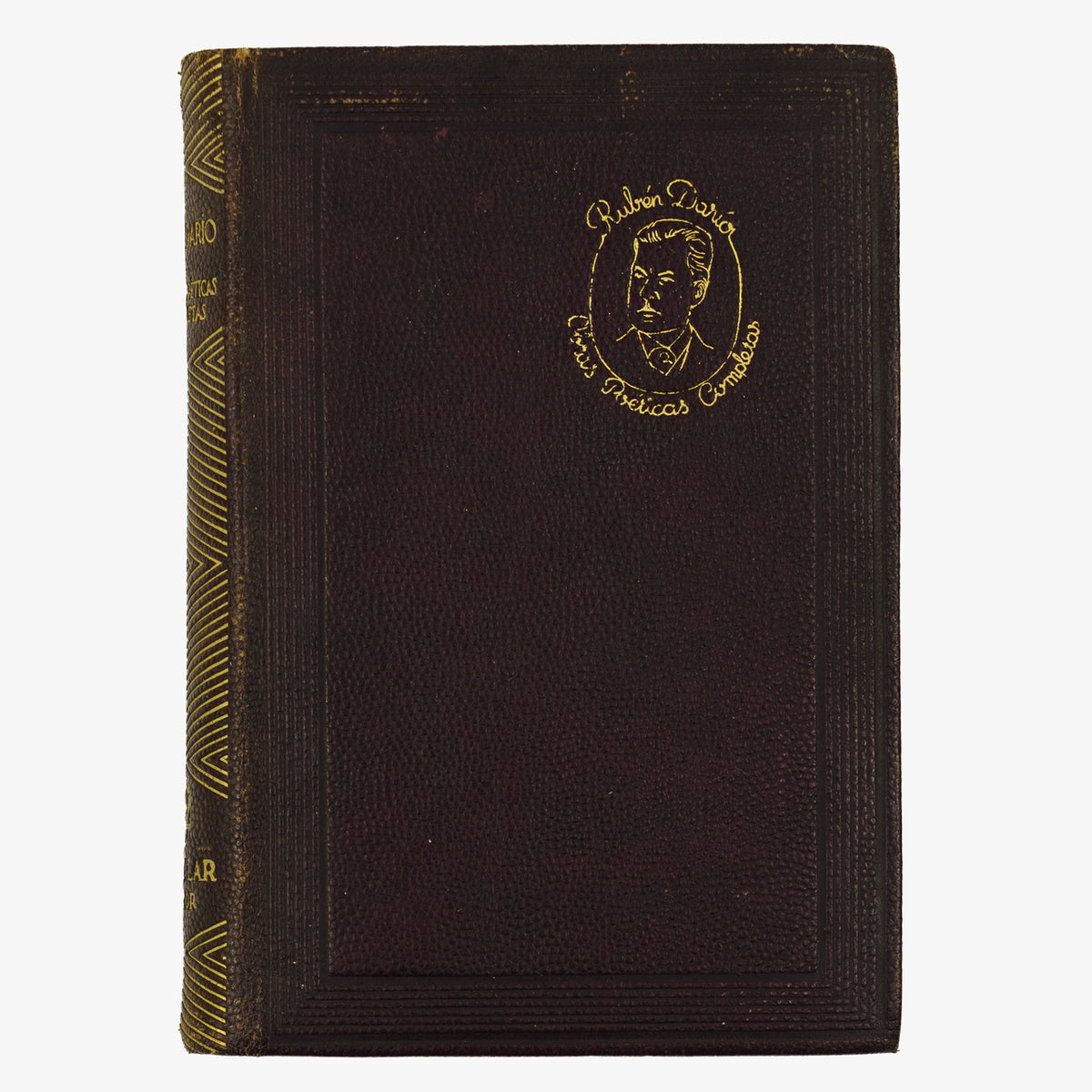 Rubén Darío — Obras poéticas completas (M. Aguilar - Editor, 1945). Encadernação em couro com douração. Cortes tingidos com ornamentos.